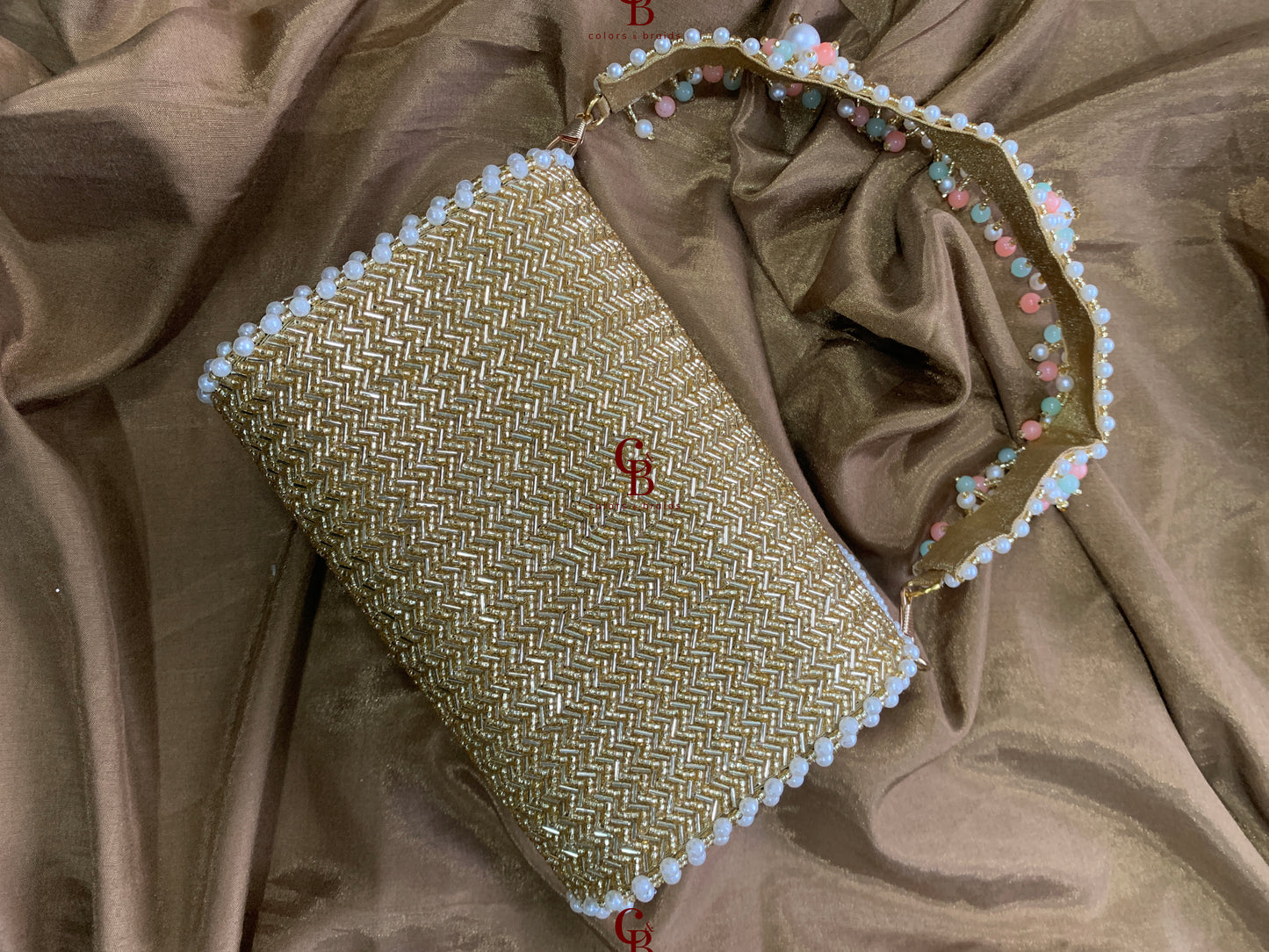 Isabelle Gold and Silver Clutch